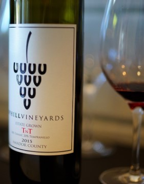 Closeup of Uphill vineyard wine bottle